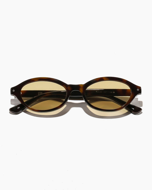 nolan ; mustard tortoiseshell / caper