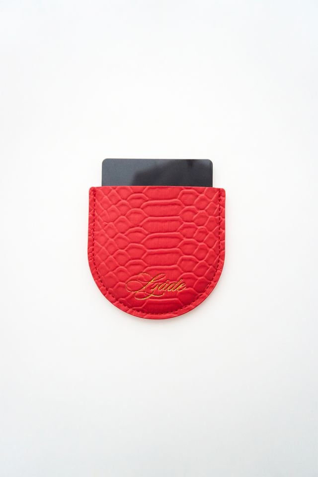 the compact - red snake skin