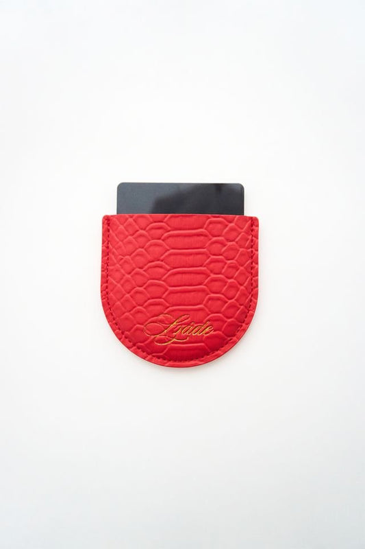 the compact - red snake skin