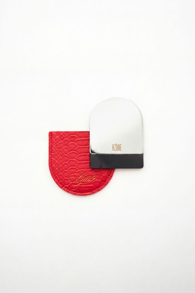 the compact - red snake skin
