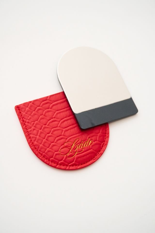 the compact - red snake skin